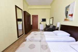 Letto o letti in una camera di Irmeni Hotel