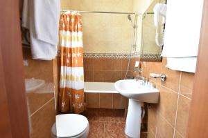 A bathroom at Irmeni Hotel