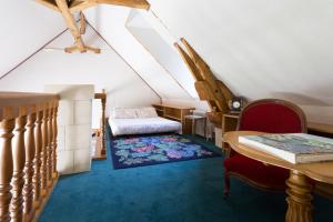Tempat tidur dalam kamar di Domaine de Brou