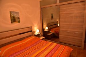 Katil atau katil-katil dalam bilik di Ferhadija Luxury Apartment