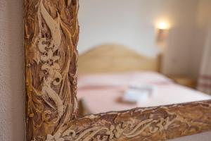 Postel nebo postele na pokoji v ubytování Gorropu Hotel