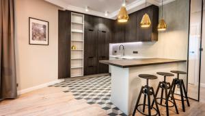 Kuchyň nebo kuchyňský kout v ubytování A11 Apartments & SPA Dermique