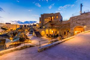 a view of the old city of jerusalem at night at Hanedan Cappadocia Suites in Urgup