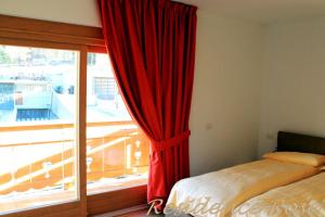 A bed or beds in a room at Residence Rose