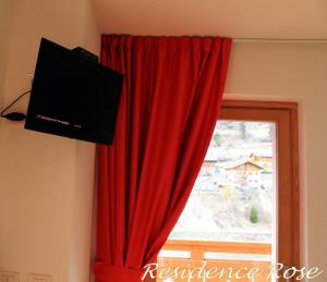 TV a/nebo společenská místnost v ubytování Residence Rose