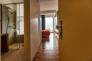 Postel nebo postele na pokoji v ubytování Hotel Internazionale