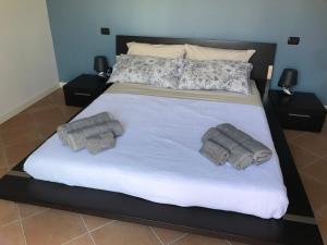 Posteľ alebo postele v izbe v ubytovaní Resort Borgo del Torchio