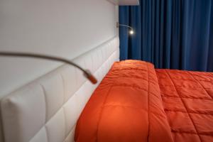 Postel nebo postele na pokoji v ubytování Hotel Internazionale