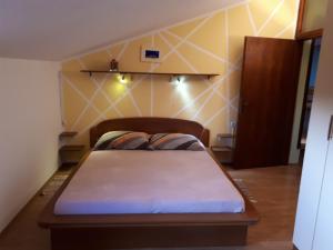 Postel nebo postele na pokoji v ubytování Apartman Aleks