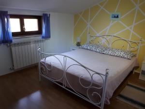 Postel nebo postele na pokoji v ubytování Apartman Aleks