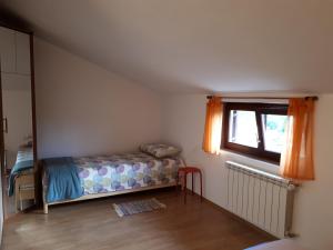 Postel nebo postele na pokoji v ubytování Apartman Aleks