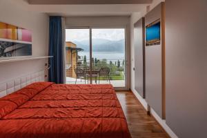 Postel nebo postele na pokoji v ubytování Hotel Internazionale + 37 fotografií