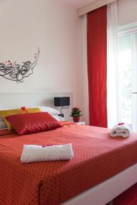 Кровать или кровати в номере Hotel Villa Chiara