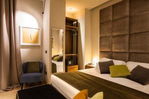 Voodi või voodid majutusasutuse Triviho Hotel toas