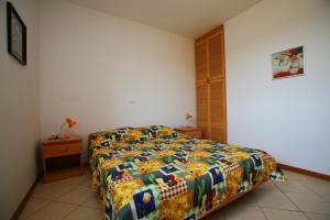 Posteľ alebo postele v izbe v ubytovaní Apartments Villa Oliva