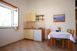 Kuchyňa alebo kuchynka v ubytovaní Apartments Villa Oliva