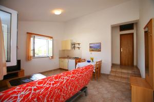 Posteľ alebo postele v izbe v ubytovaní Apartments Villa Oliva