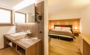 Postel nebo postele na pokoji v ubytování Hotel Shandranj