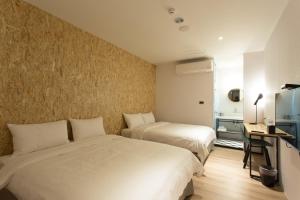 Cama o camas de una habitación en Let's Hostel