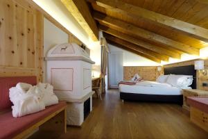 Postel nebo postele na pokoji v ubytování Hotel Shandranj