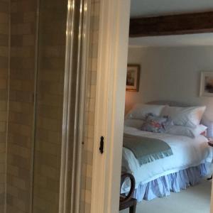 Katil atau katil-katil dalam bilik di Swan Cottage +20 gambar