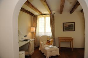 Postel nebo postele na pokoji v ubytování Hotel Relais Vecchio Maso