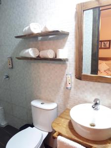 Koupelna v ubytování Hotel Omer
