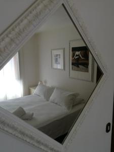 Llit o llits en una habitació de Toscanamente