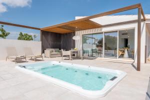 The swimming pool at or close to Cas Cabo Nou Agroturismo Adults Only
