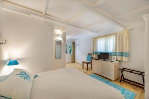 A bed or beds in a room at Casa Saltara