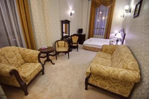 Кровать или кровати в номере Hotel Carol