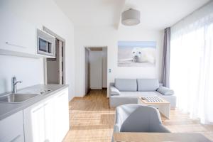 Posezení v ubytování Apartamenty Villa Baltica Rewal - jacuzzi na dachu, wi-fi, parking w cenie