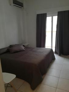 Postel nebo postele na pokoji v ubytování Hotel Marko