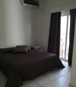 Postel nebo postele na pokoji v ubytování Hotel Marko