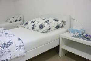 Posteľ alebo postele v izbe v ubytovaní Apartman Maksimir Relax Zagreb-75m2