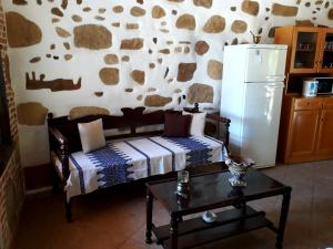 A kitchen or kitchenette at Traditional House Koukounara