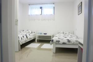Posteľ alebo postele v izbe v ubytovaní Apartman Maksimir Relax Zagreb-75m2