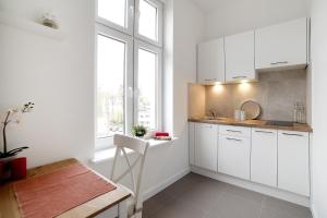 Kitchen o kitchenette sa Apartament w Centrum Olsztyna