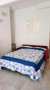A bed or beds in a room at Appartamento LE CONCHIGLIE Monterosso al mare