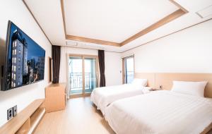 Postel nebo postele na pokoji v ubytování Hotel Run