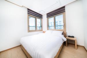 Postel nebo postele na pokoji v ubytování Hotel Run