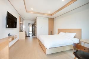 Postel nebo postele na pokoji v ubytování Hotel Run