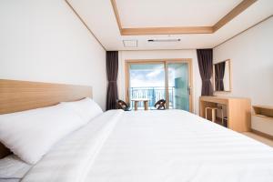Postel nebo postele na pokoji v ubytování Hotel Run