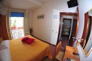 Postel nebo postele na pokoji v ubytování Hotel Antares