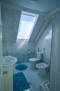 Kúpeľňa v ubytovaní Katica Apartman