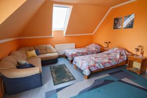Posteľ alebo postele v izbe v ubytovaní Katica Apartman + 37 fotografií