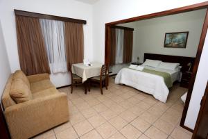 Postel nebo postele na pokoji v ubytování Hotel Schroeder