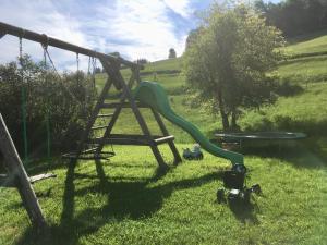 Ein Kinderspielbereich in der Unterkunft Feichtingerhof