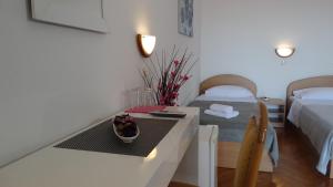 Postel nebo postele na pokoji v ubytování Guest House Mamut