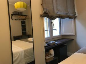 Ein Bett oder Betten in einem Zimmer der Unterkunft Residenza Roma Imperiale